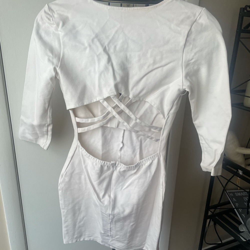 White cocktail dress with open back